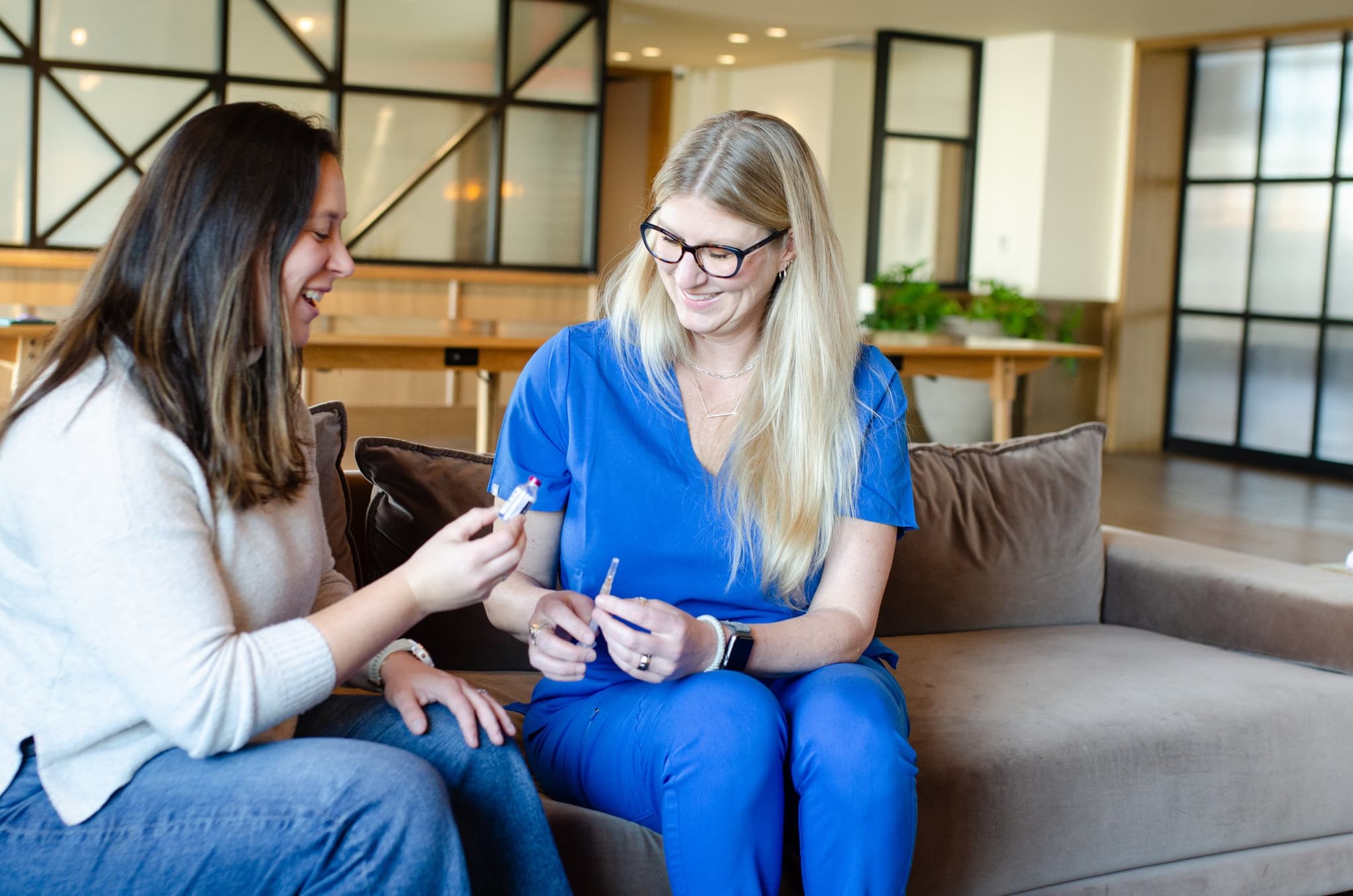 A Luna nurse coaching a client through a fertility injection at home